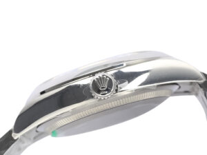 Side view of the Oyster Perpetual 36 Stainless Steel with Silver Dial, showcasing the crown and sleek stainless steel casing.