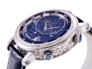 Celestial stainless steel watch with intricate blue dial design, silver casing, and dark leather strap on product display.