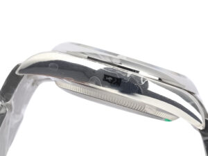 Side profile of the Oyster Perpetual 36 Stainless Steel watch showcasing its sleek case design and polished finish.