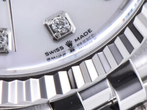 Close-up of Datejust 36 Stainless Steel Jubilee with Diamond Mother of Pearl Dial Fluted Bezel, showcasing Swiss Made detail.