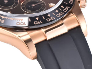 Close-up of Cosmograph Daytona Rose Gold Oysterflex with Chocolate Dial, showcasing its rose gold case and black strap.