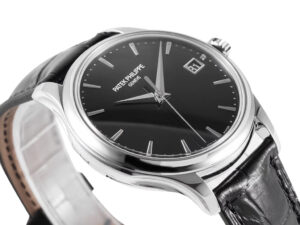 Calatrava Stainless Steel watch with black dial, 39mm case size, silver hour markers, and black leather strap.