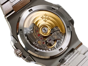 Close-up view of the open case back of Nautilus Stainless Steel with White Dial, showcasing its intricate automatic movement.