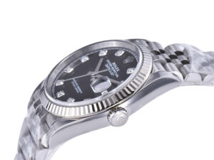 Datejust 36 Stainless Steel watch on Jubilee bracelet, Diamond Black Dial, Fluted Bezel, and Cyclops lens over date.
