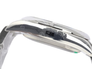 Side view of the Oyster Perpetual 36 Stainless Steel watch showcasing its polished casing and streamlined design.