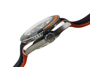 Side view of the Seamaster Planet Ocean 600 with blue dial, orange bezel accents, and rubber strap showcasing its profile.