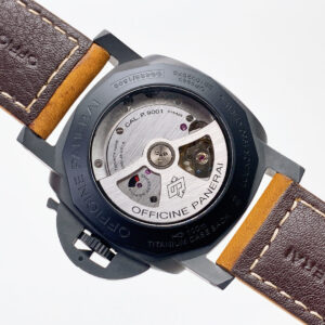 Back view of Luminor 1950 3 Days GMT Automatic Ceramica showcasing the open caseback and movement, with a leather strap.