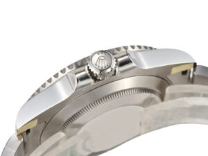 Side view of the Submariner (No Date) Stainless Steel watch case, showcasing the crown and brushed metal finish.