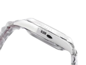 Side view of the Day-Date 40 White Gold ‘President’ with fluted bezel, showcasing sleek profile and meticulous craftsmanship.