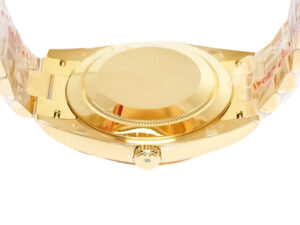 Back view of Day-Date 40 Yellow Gold ‘President’ watch showcasing its case back and crown with protective stickers.