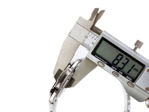 Caliper measuring the thickness of Nautilus Stainless Steel ‘Tiffany’ watch with Tiffany Blue Dial (40mm), showing 8.31mm.