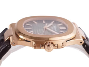 Side view of the Nautilus Rose Gold with Chocolate Dial on Leather Strap, showcasing its elegant design and crown detail.