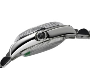 Side view of the Lady-Datejust 28 Stainless Steel with fluted bezel and Jubilee bracelet showcasing the crown detail.