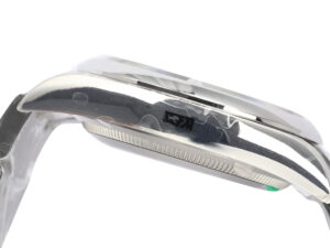 Side view of the Oyster Perpetual 36 Stainless Steel watch, showcasing its polished casing and sleek edge details.