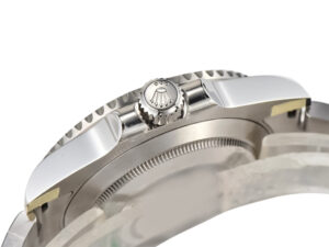 Side view of the Submariner Date Stainless Steel 'Hulk' (40mm), highlighting the crown with Rolex logo and polished details.