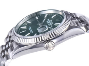Alt text: Close-up of Datejust 36 Stainless Steel on Jubilee bracelet with Mint Green Dial and Fluted Bezel.