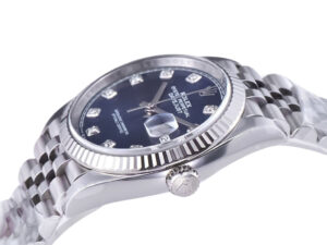 Datejust 36 Stainless Steel on Jubilee, Diamond Blue Dial, Fluted Bezel close-up showcasing intricate design details.
