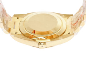 Back view of the Day-Date 40 Yellow Gold 'President' watch featuring a gold case back and signature fluted bezel.