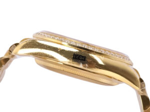 Side view of the Day-Date 36 Yellow Gold ‘President’ watch showcasing its diamond bezel and polished yellow gold case.