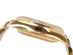 Side view of the Day-Date 36 Yellow Gold 'President' watch featuring a diamond bezel and gold bracelet.