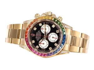 Cosmograph Daytona Yellow Gold ‘Rainbow’ watch with diamond bezel, colorful sapphire accents, and black dial face.