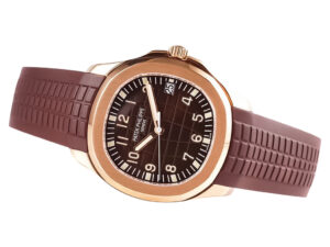 Aquanaut Rose Gold with Chocolate Dial (40mm) featuring a textured brown strap and luminous numerals on the dial.