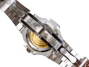 Rear view of the Nautilus Stainless Steel 'Tiffany' watch, showcasing its transparent case back and engraved gold rotor.