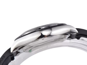 Side view of the Cosmograph Daytona Stainless Steel Oysterflex with Grey Sunburst Dial, showcasing polished stainless case.