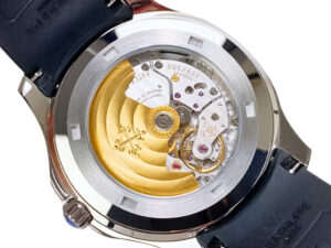 Back view of the Aquanaut Stainless Steel (40mm) showcasing its intricate mechanical movement with a black strap.