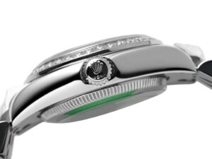 Side profile of the Lady-Datejust 28 Stainless Steel, showing the fluted bezel, crown with logo, Jubilee bracelet connection.