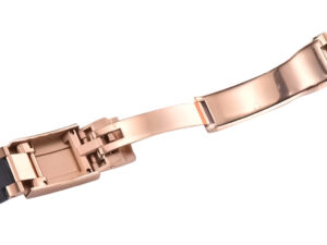 Rose gold clasp detail of the Cosmograph Daytona Oysterflex chocolate dial watch, showcasing intricate craftsmanship.