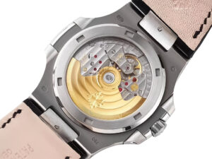 Rear view of the Nautilus Stainless Steel watch showcasing its exposed mechanical movement, grey dial, and leather strap.