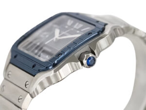 Santos Large Stainless Steel watch (40mm) with a blue dial, blue bezel, and crown detail featuring a blue gemstone accent.