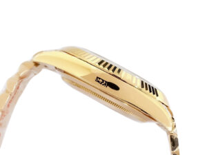 Side view of the Day-Date 40 Yellow Gold ‘President’ watch with Champagne Dial and Fluted Bezel, showcasing its profile.
