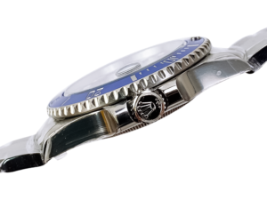 Submariner Date Stainless Steel ‘Cookie Monster’ (41mm) watch side view showcasing blue bezel, crown, and polished finish.