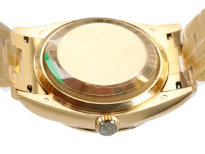 Back view of the Day-Date 36 Yellow Gold 'President' watch, showcasing its polished case and signature crown engraving.