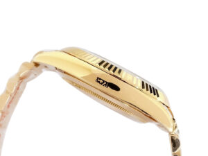 Side profile of the Day-Date 40 Yellow Gold 'President' watch showcasing its fluted bezel and polished finish.
