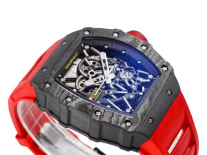 RM 35-02 Rafa watch with black bezel, red markers, skeleton dial, and a vibrant red rubber strap (49mm) displayed at angle.