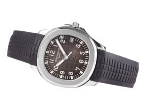 Aquanaut Stainless Steel watch (38mm) with black textured dial, Arabic numerals, and black rubber strap.