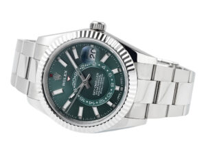 Sky-Dweller Stainless Steel watch featuring a green dial, fluted bezel, and Oyster bracelet displayed at an angle.