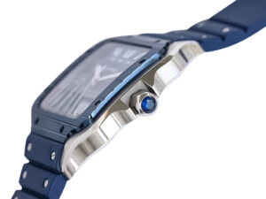 Close-up side view of Santos Large Stainless Steel watch with blue dial, blue bezel, and rubber strap (40mm).