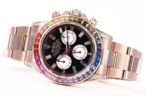 Cosmograph Daytona Rose Gold 'Rainbow' with Diamond Bezel, featuring a multicolor sapphire-set bezel and rose gold bracelet.