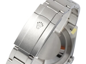 Close-up of the clasp on the Oyster Perpetual 41 Stainless Steel watch, featuring a brushed finish and engraved crown logo.