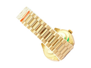 Day-Date 40 Yellow Gold ‘President’ watch with fluted bezel, onyx diamond dial, and gold bracelet shown from the back.