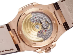 Back view of the Nautilus Rose Gold with Chocolate Dial on Leather Strap, showcasing intricate automatic movement detail.