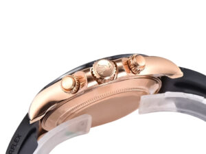 Side view of the Cosmograph Daytona Rose Gold Oysterflex watch with Chocolate Dial, showcasing its crown and pushers.