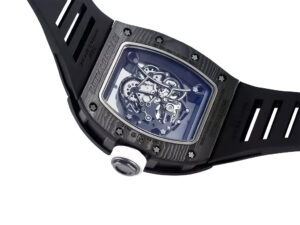 RM055 Bubba Watson watch with a white dial, black bezel, visible mechanics, and black rubber strap, shown from the back.