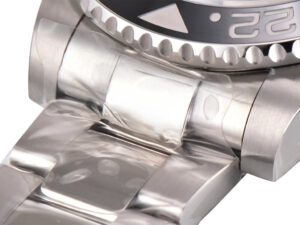 Close-up of the stainless steel bracelet and case of the GMT-Master II 'Sprite' on Oyster, showcasing its polished finish.
