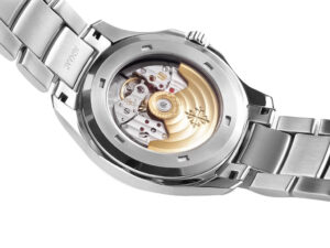 Back view of the Aquanaut Date Stainless Steel watch (40mm) showcasing its intricate rhodium dial and mechanical movement.