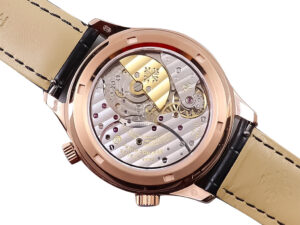 Back view of the Celestial Only Watch Rose Gold with Black Dial, showcasing the mechanical movement and beige leather strap.